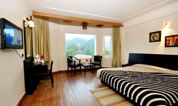 Hotel Suman Paradise Nainital Pokoj fotografie